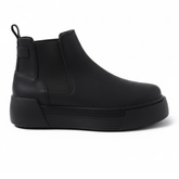 Side profile of matte black Avalon Chelsea boots with cushioned platform sole.