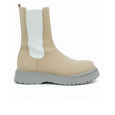 Side view of Zenith Sand Chelsea Boots by Apollo Moda in beige suede with a gray sole and white elastic panels.