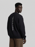 Sweat-shirt oversize « Vous êtes tous illégaux »