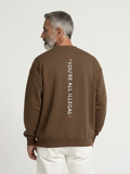 Sweat-shirt oversize « Vous êtes tous illégaux »